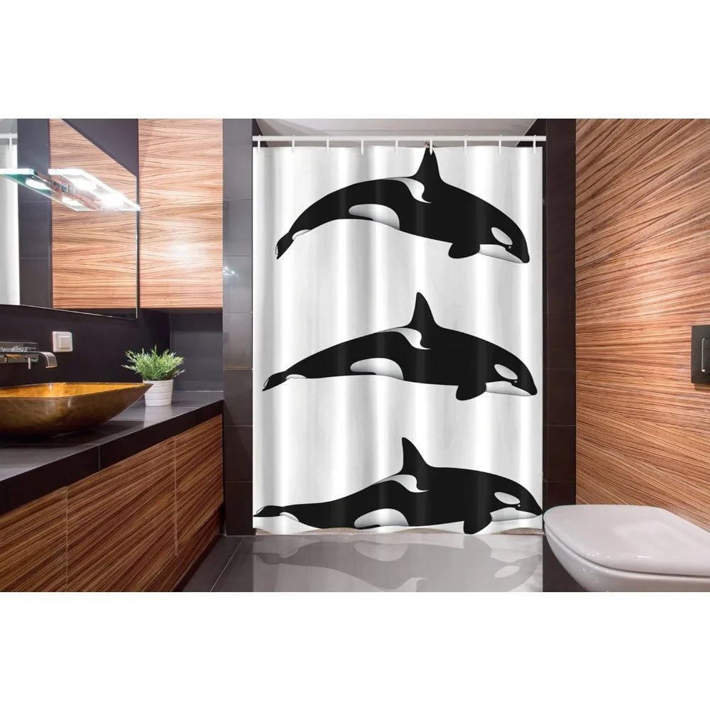 Three black and white killer whales on fabric bathroom