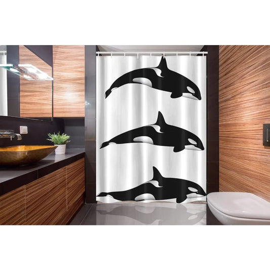 Three black and white killer whales on fabric bathroom